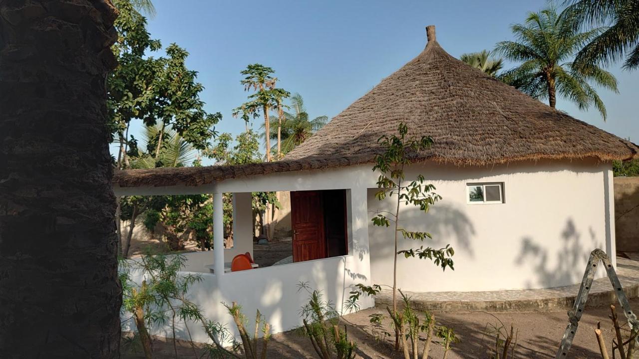 Case traditionnelle diola au bord de l'océan Cap Skirring Extérieur photo